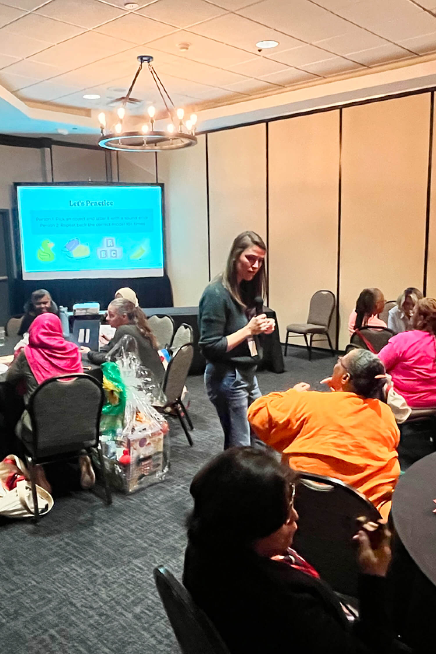 Kelly Goldberg giving a live in person training to group of child care providers