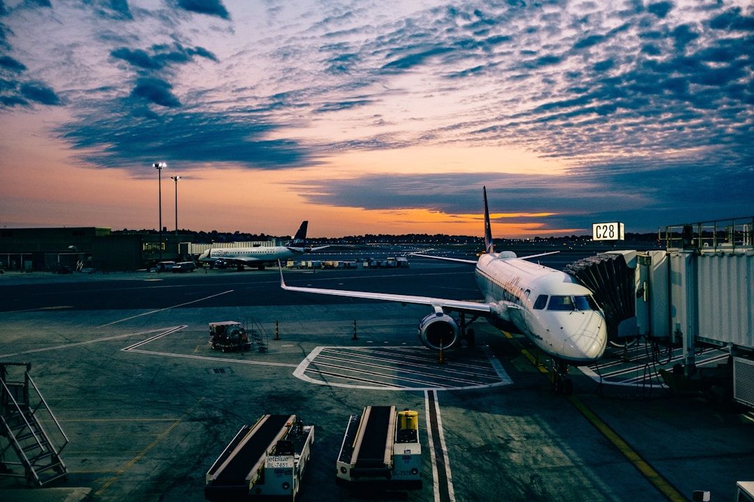 Aircraft at gate at sunset