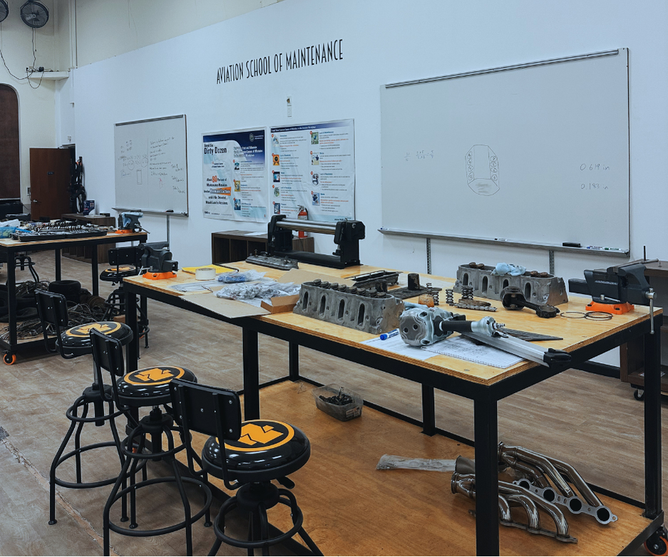ASM San Antonio shop — real engine components, vises, and workbenches for oral & practical prep