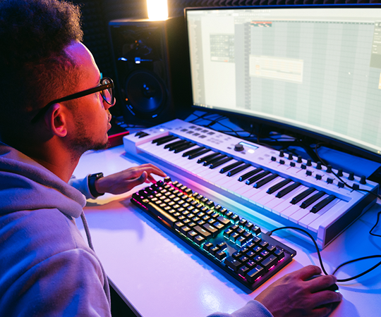 Young man playing keyboard