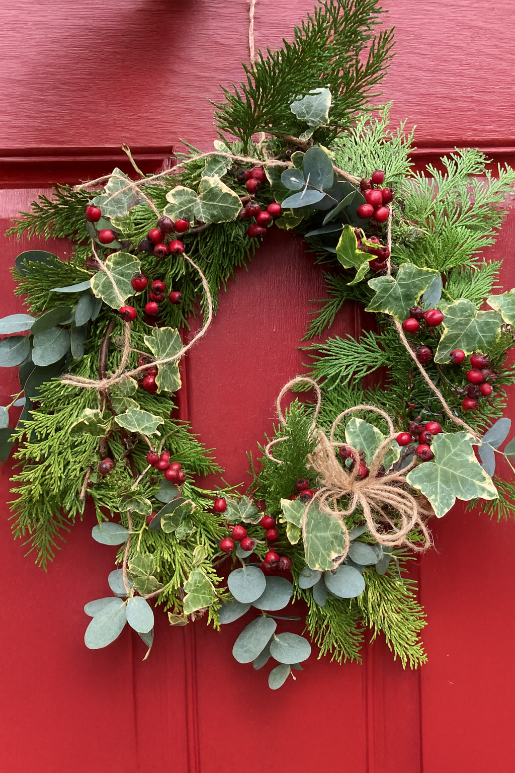 A festive wreath made from foraged greenery