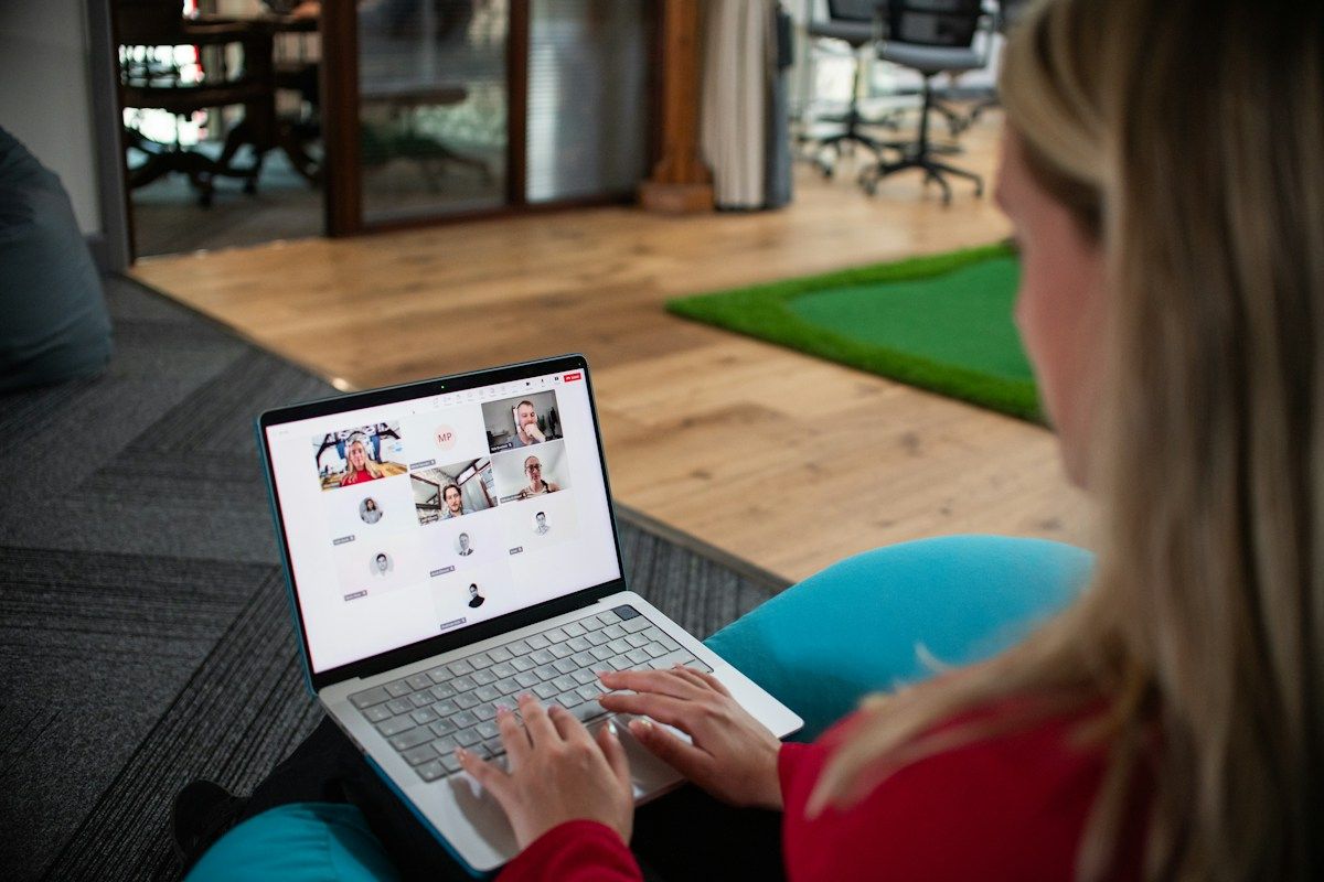 A learner taking part in a group video call. Illustrative stock photograph.