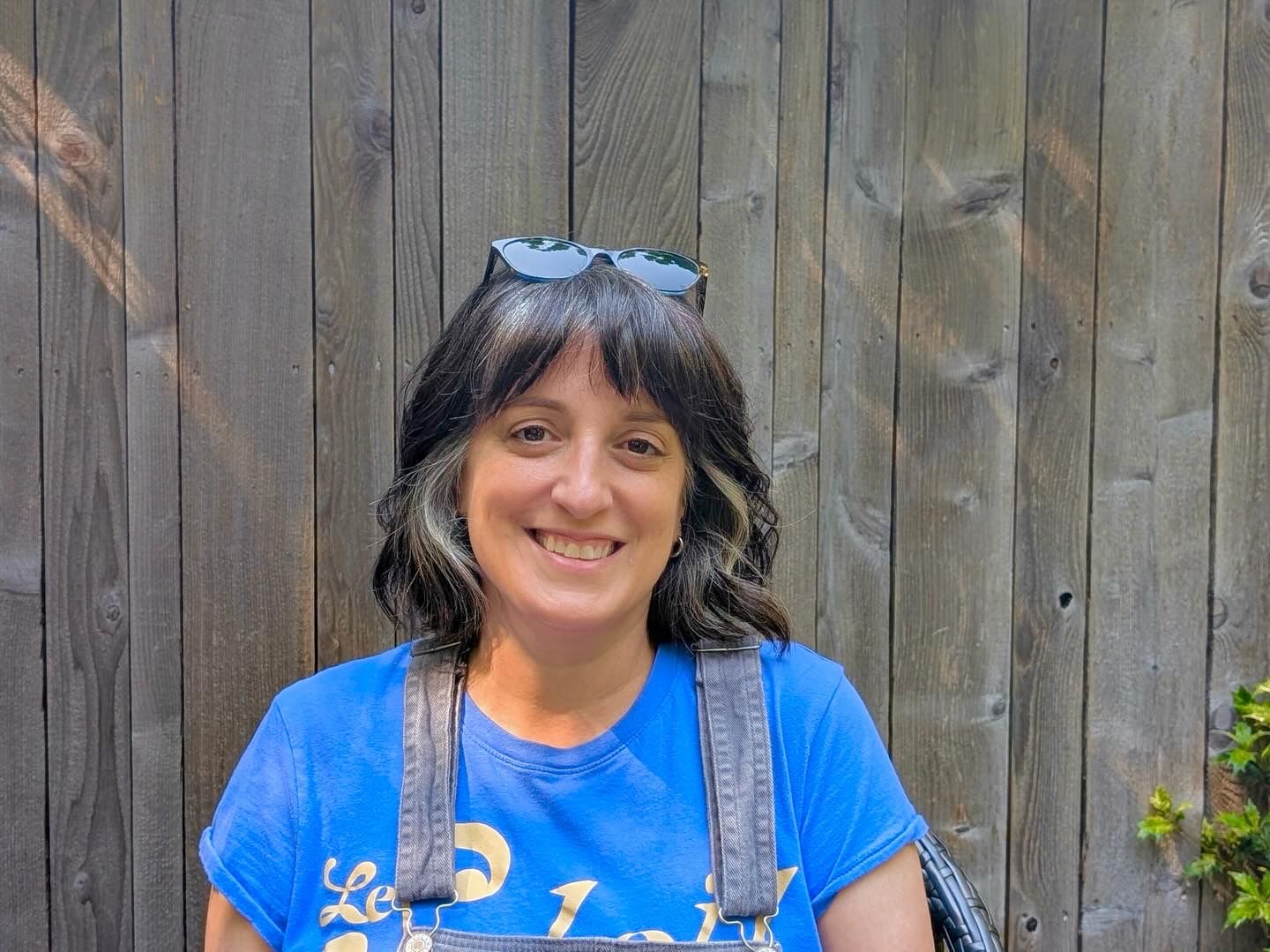 A smiling woman in a natural background