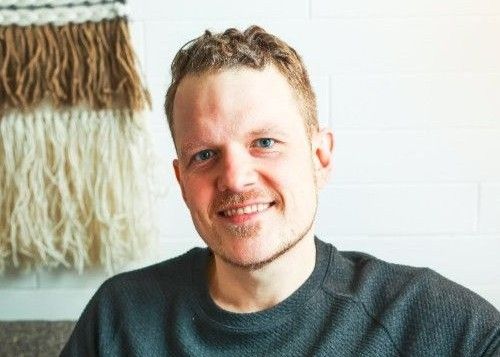 Portrait photo of Derek Weiss, Executive Director, Frontier Marketing