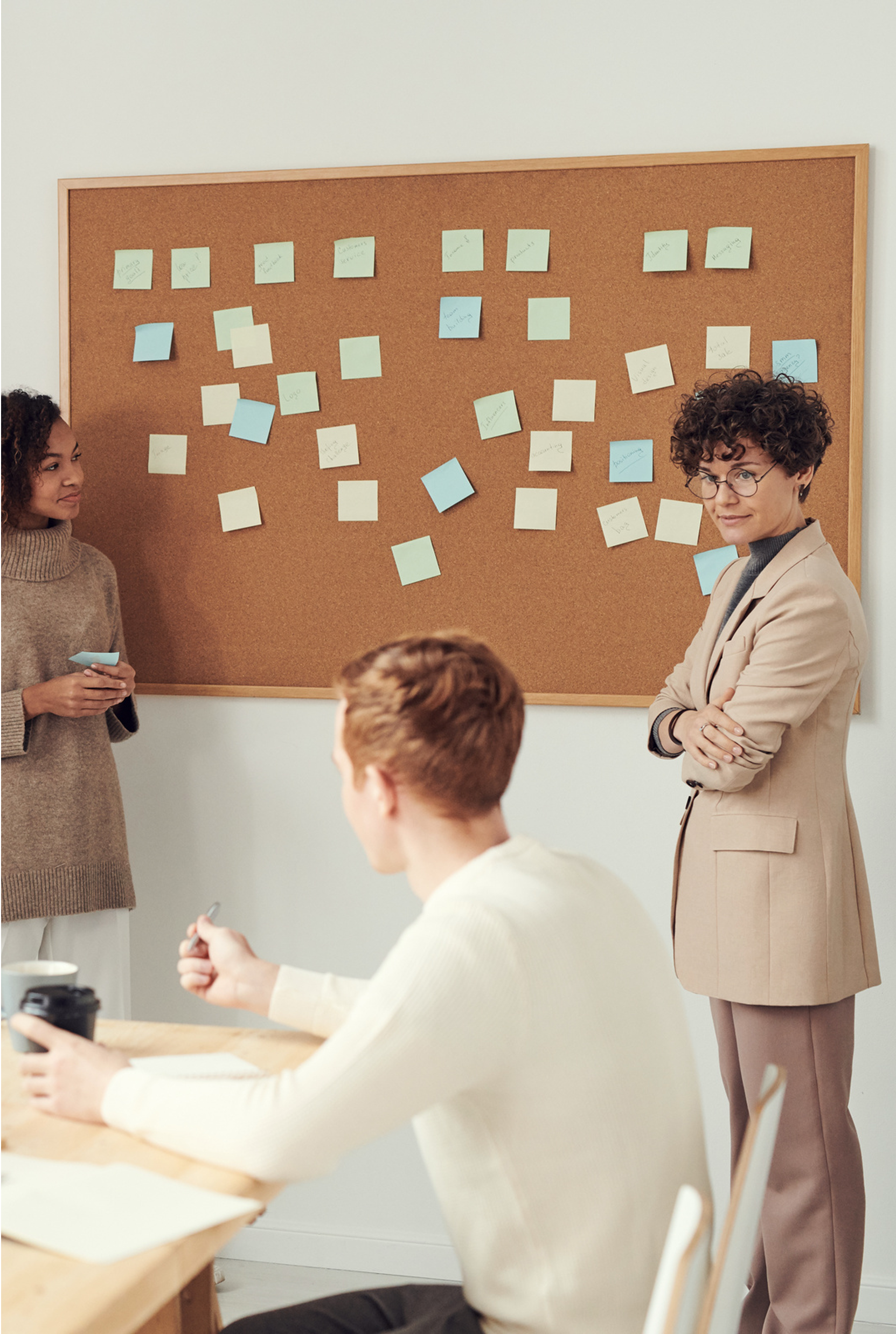 Group of entrepreneurs pointing at a screen