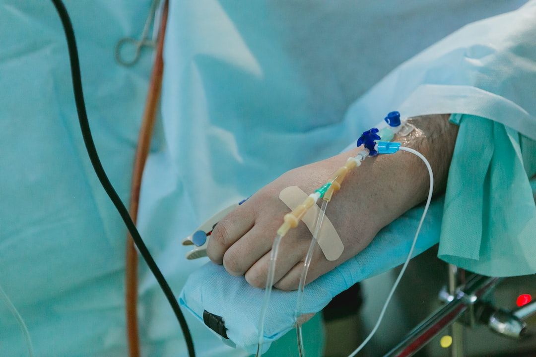 A photo os someone lying in hospital with drip connected suffering from food poisoning, which reminds us why food safety is important