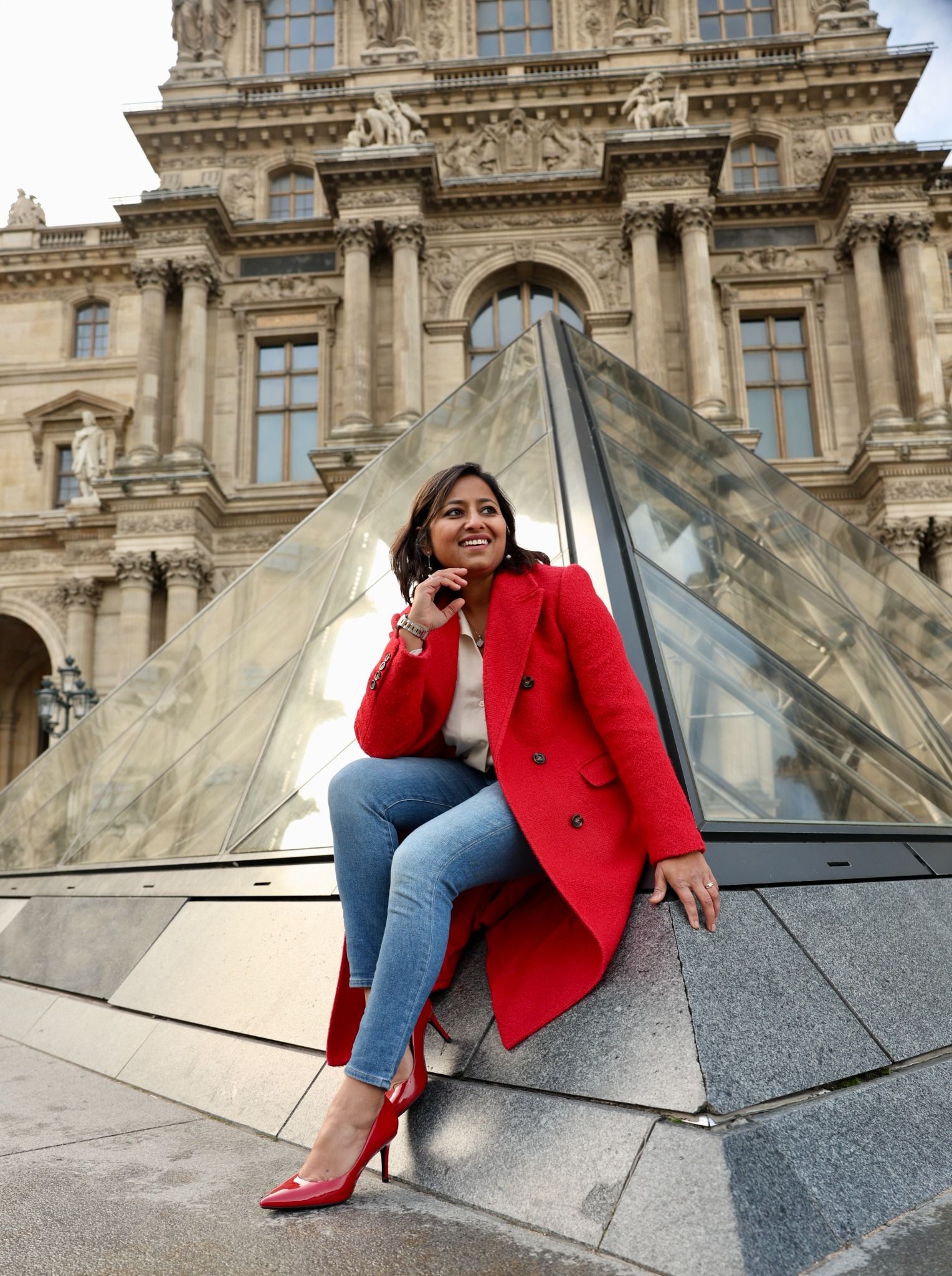 Richa Bansal, founder of Pinkcareers, smiling in a relaxed portrait