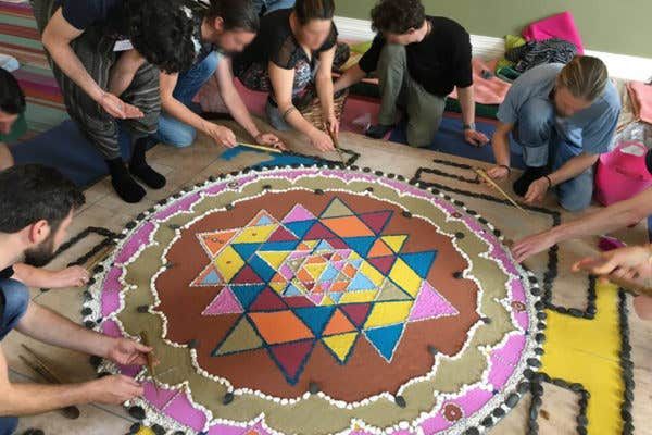 Group mandala in the process of being created at one of our past retreats in Ireland