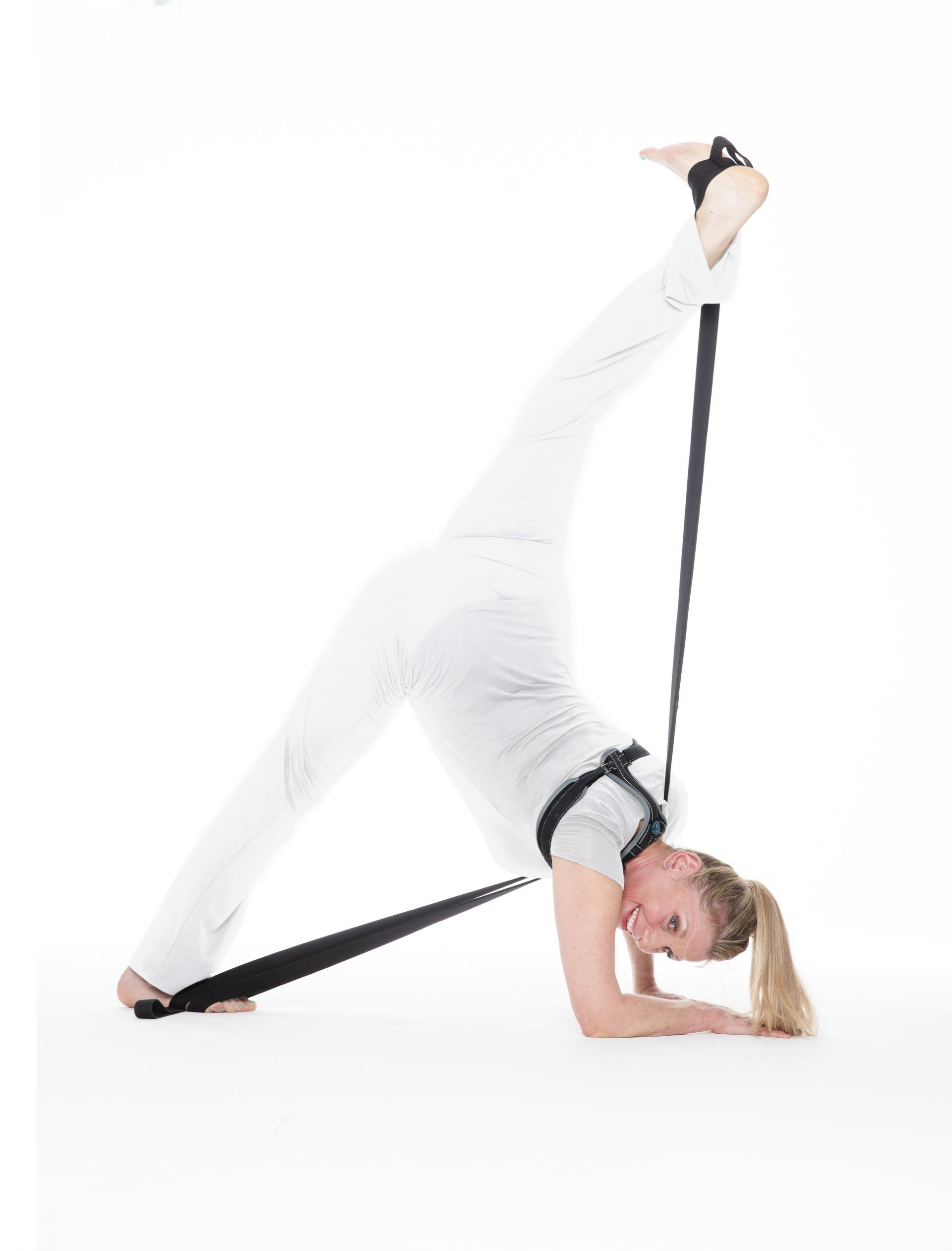 Stacey in penche standing over-split using Stacey Stretch Strap® & Stacey Posture Strap