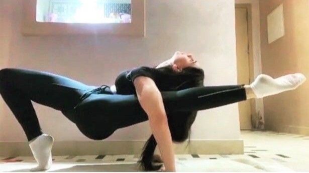 Testimonial of increased flexibility in advanced yoga pose