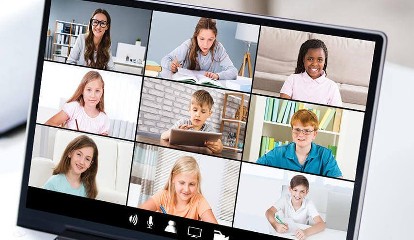 students and teacher in an online lesson