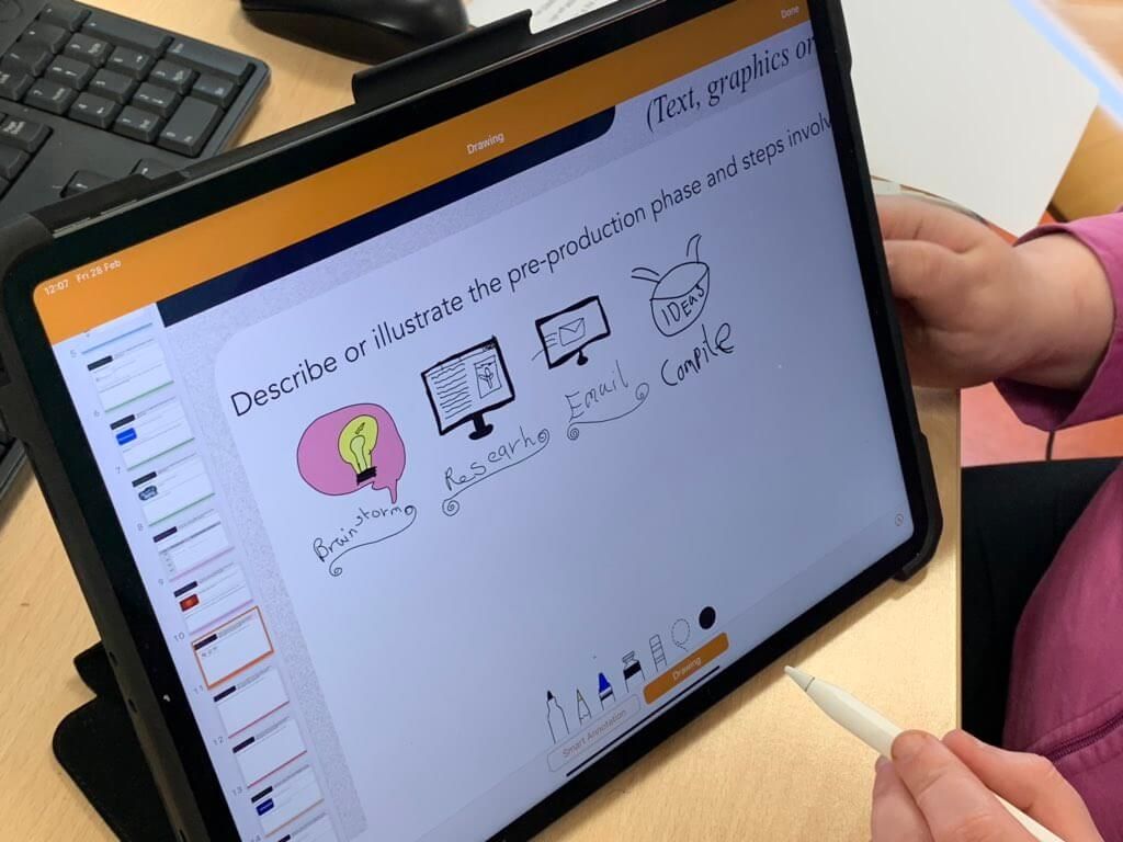 a student working on a project on ipad